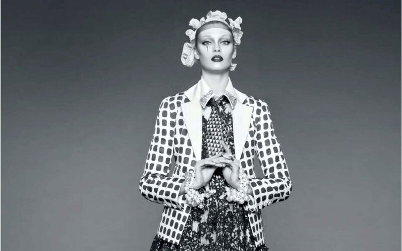 model in patterned suit
