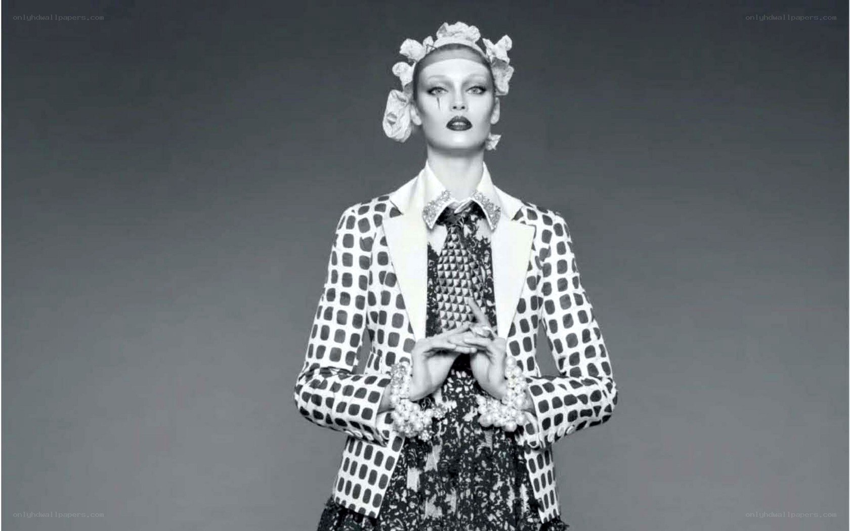 model in patterned suit