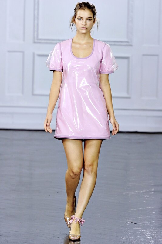 Model in pink dress on runway