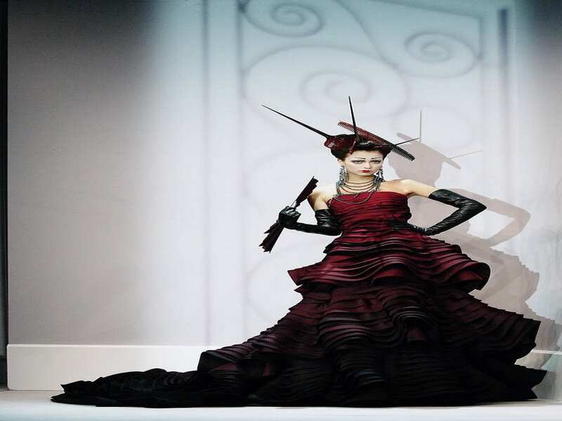Model in red and black gown