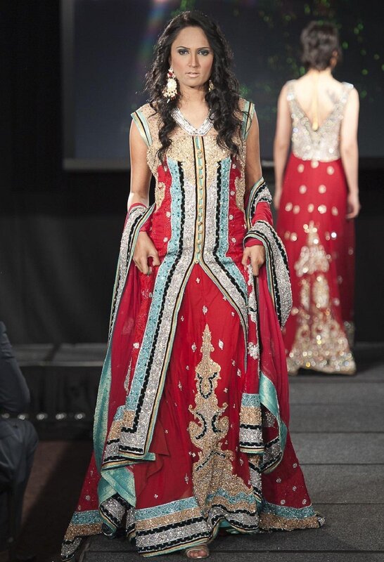 Model in red and gold lehenga
