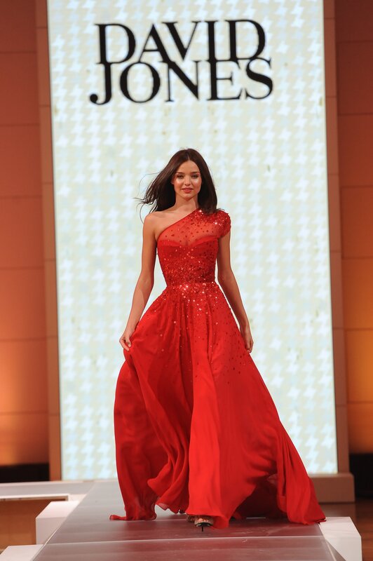 Model in Red Gown — Confident