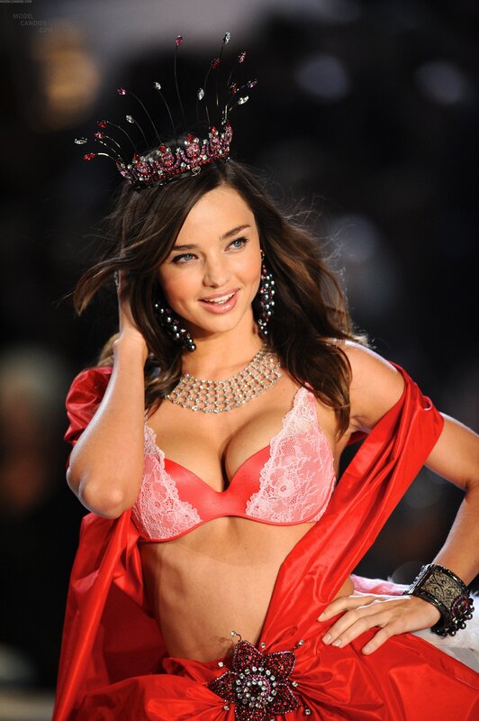 model in red lingerie and crown