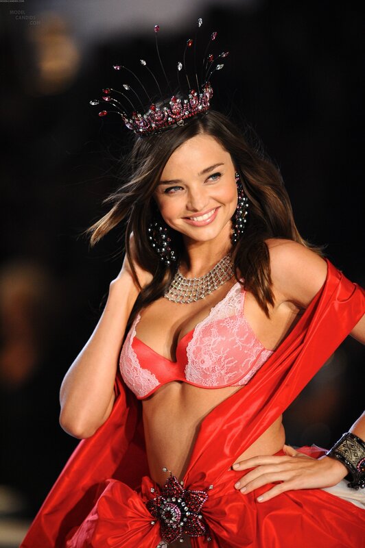 Model in red lingerie and crown