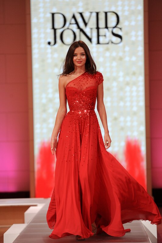 Model in red sequin gown
