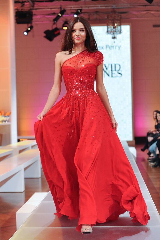 Model in red sequin gown