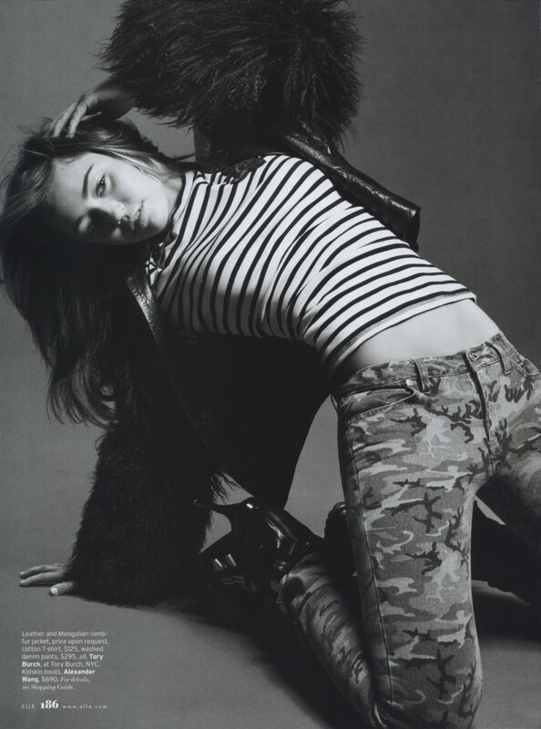 model in striped top and camo pants