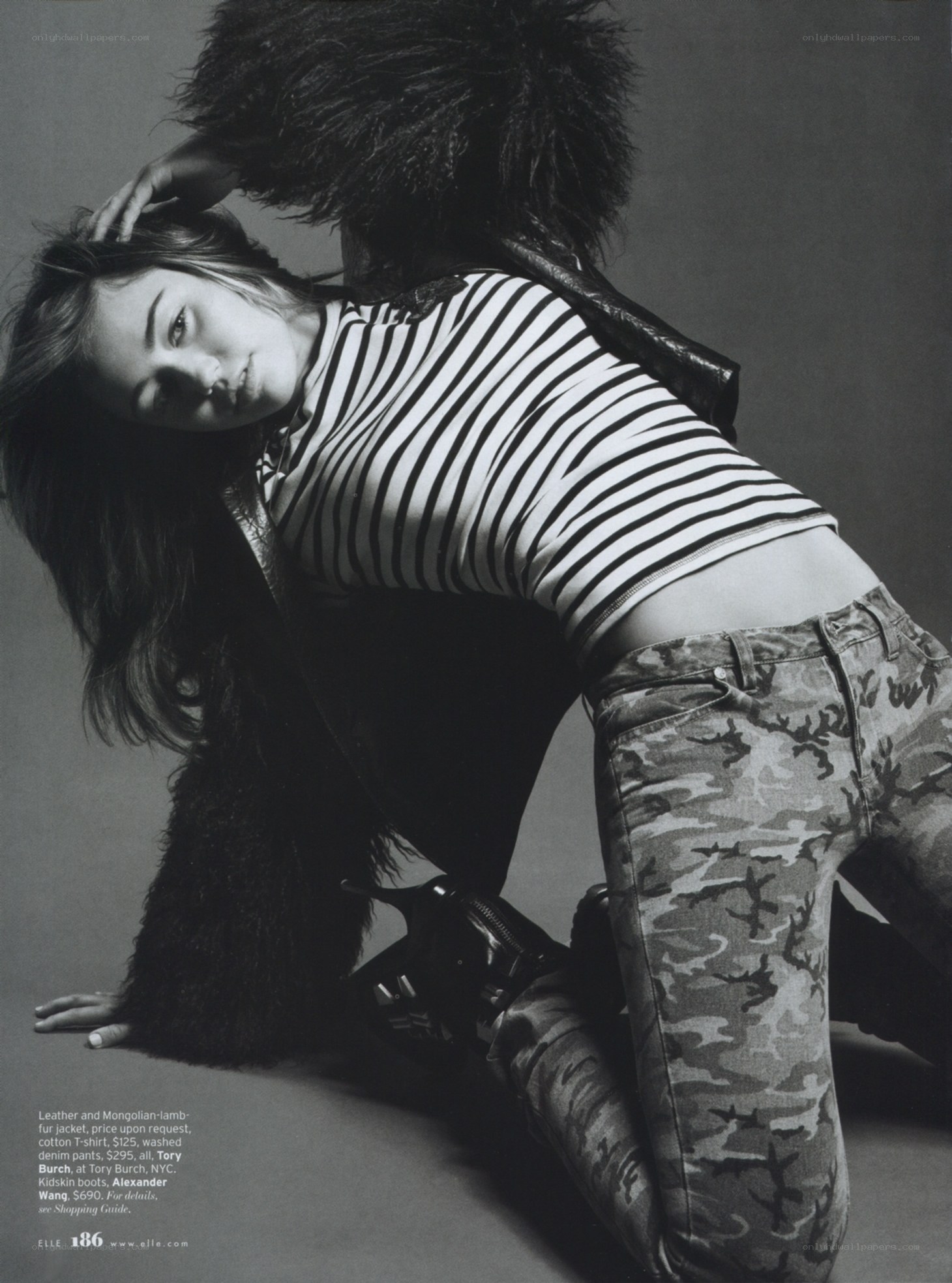 model in striped top and camo pants
