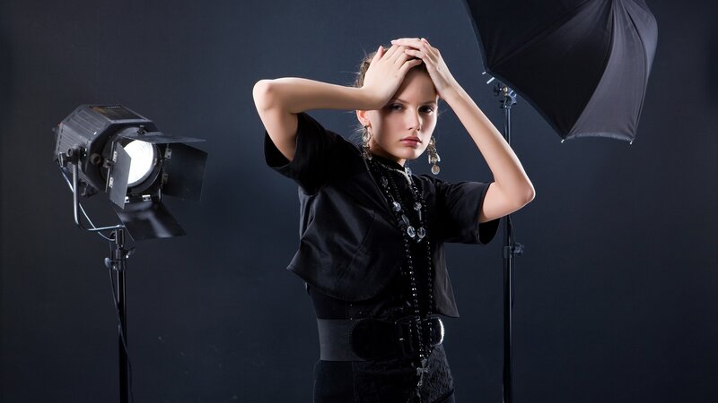 model in studio with lighting