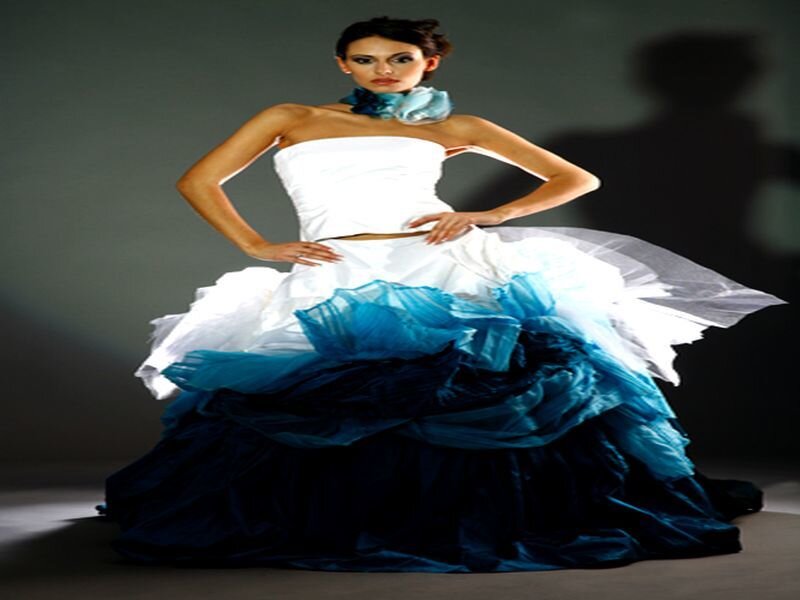 model in white and blue gown