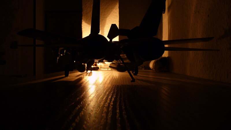 model jet on wooden surface