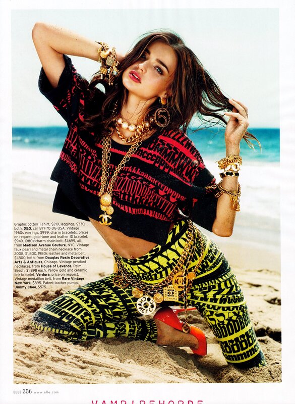 Model on beach in graphic outfit