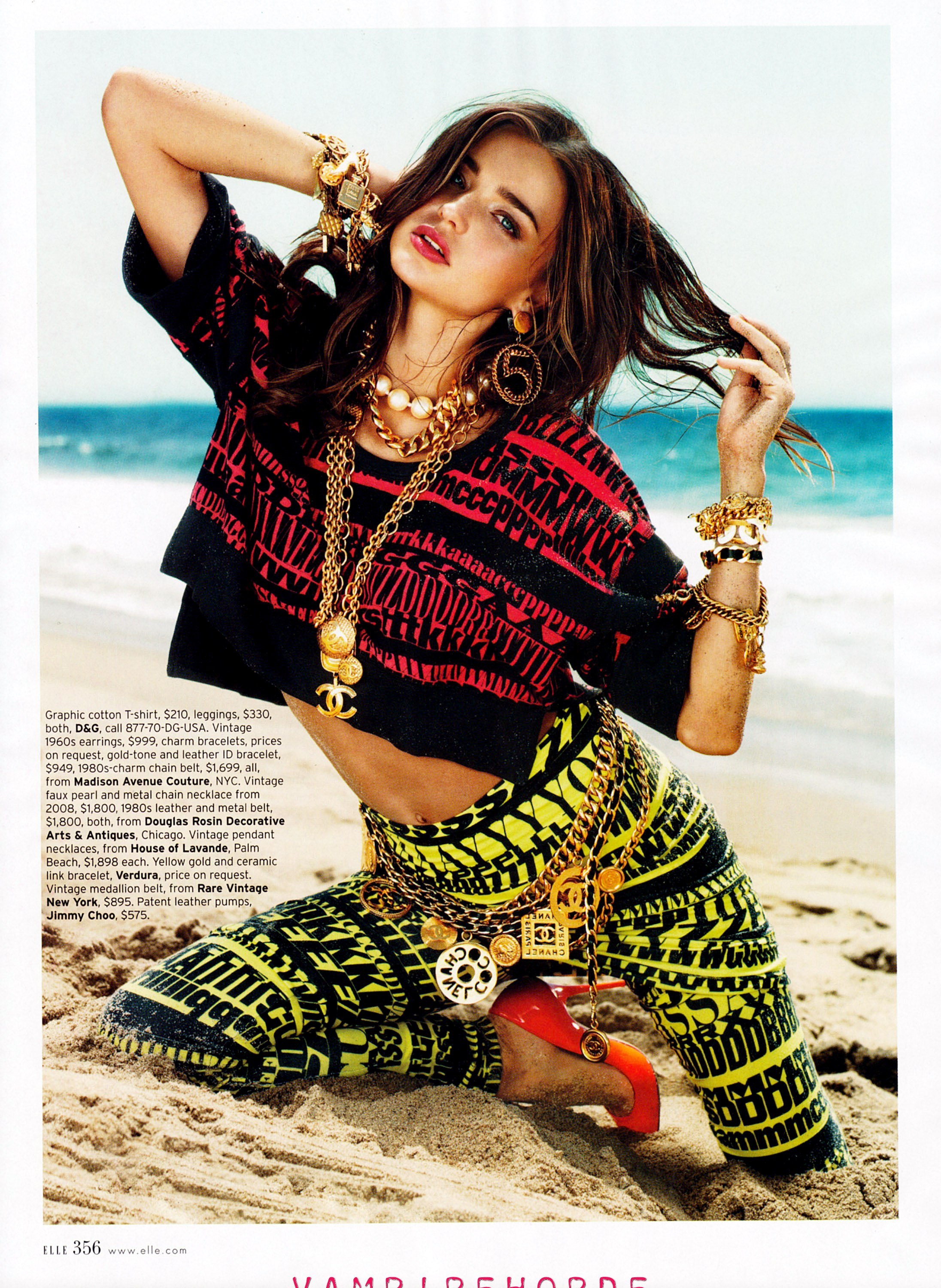 Model on beach in graphic outfit
