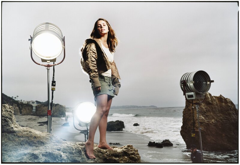 model on beach with studio lights