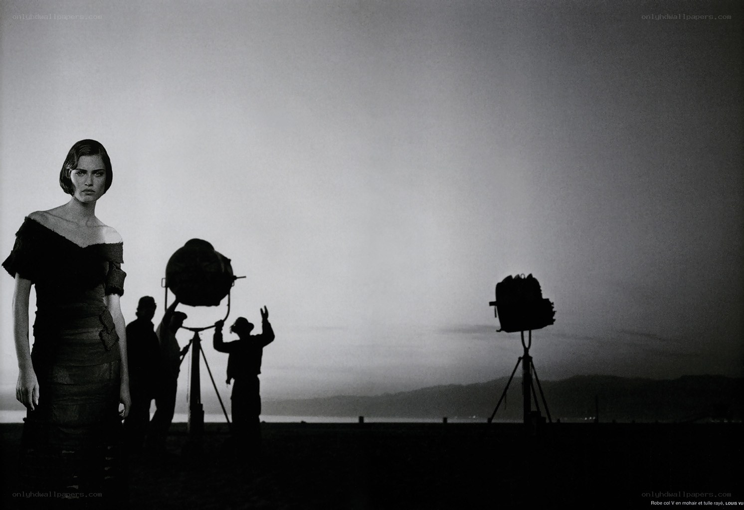 model on film set at dusk