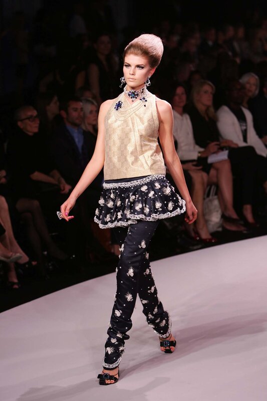 Model on runway in fashion show