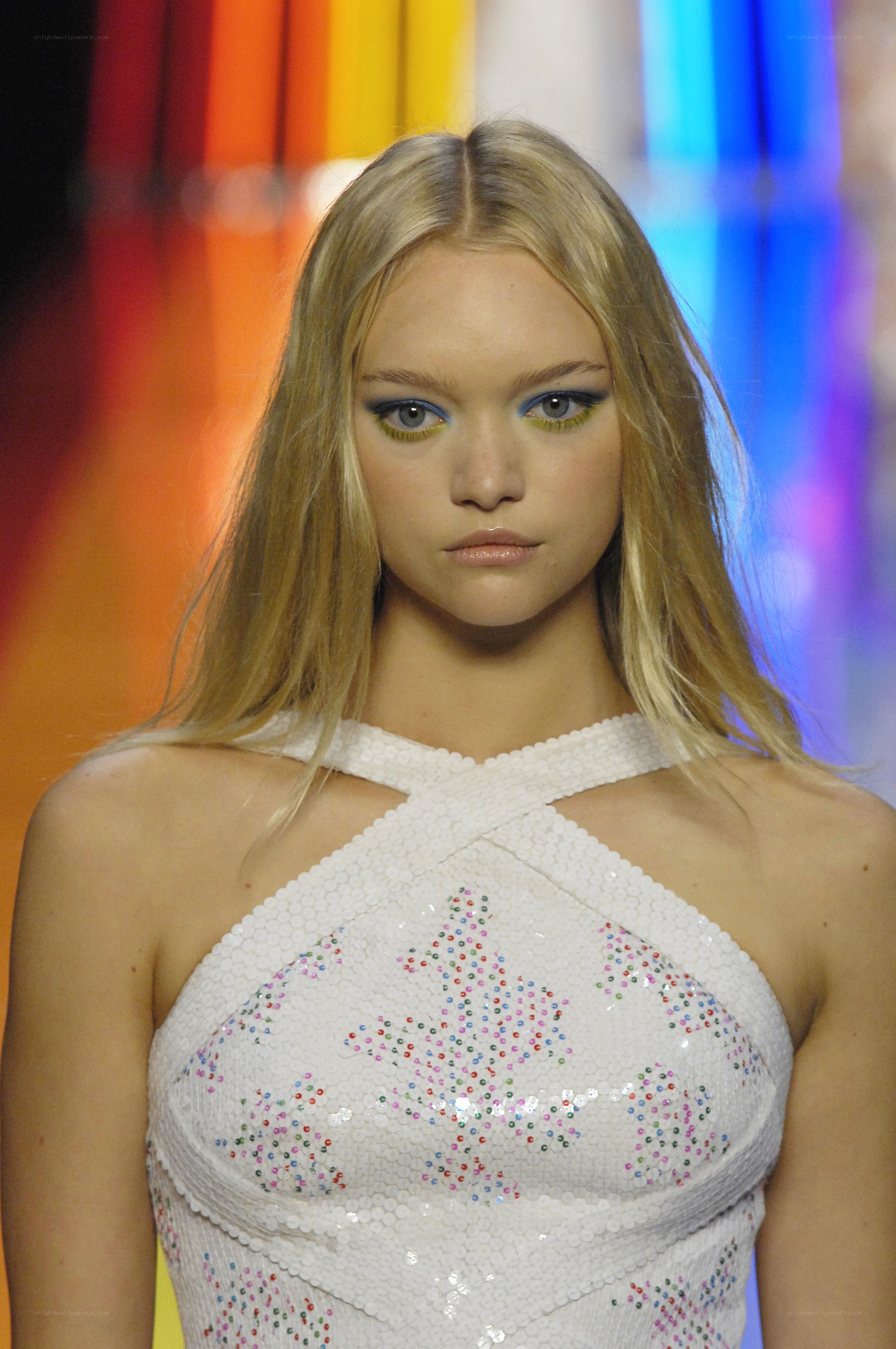 model on runway in sequined dress