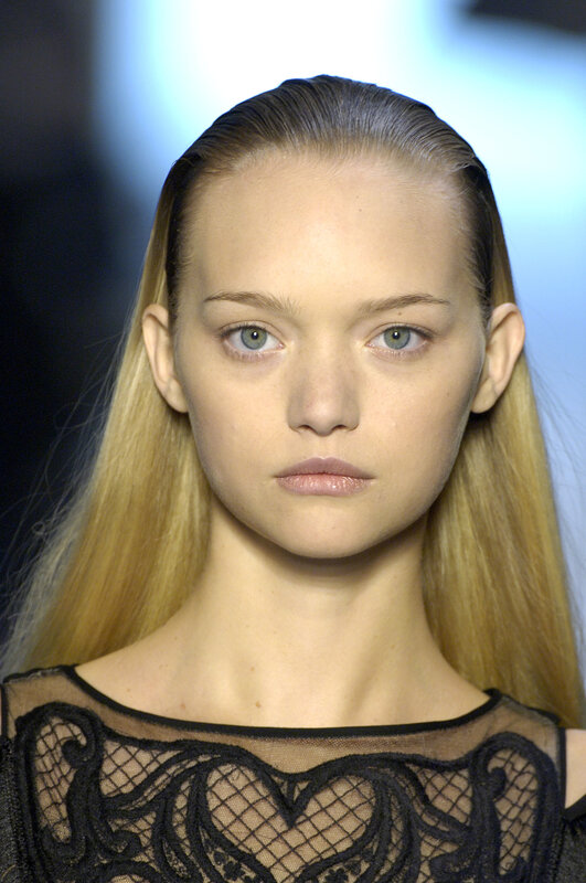 model on runway with blonde hair