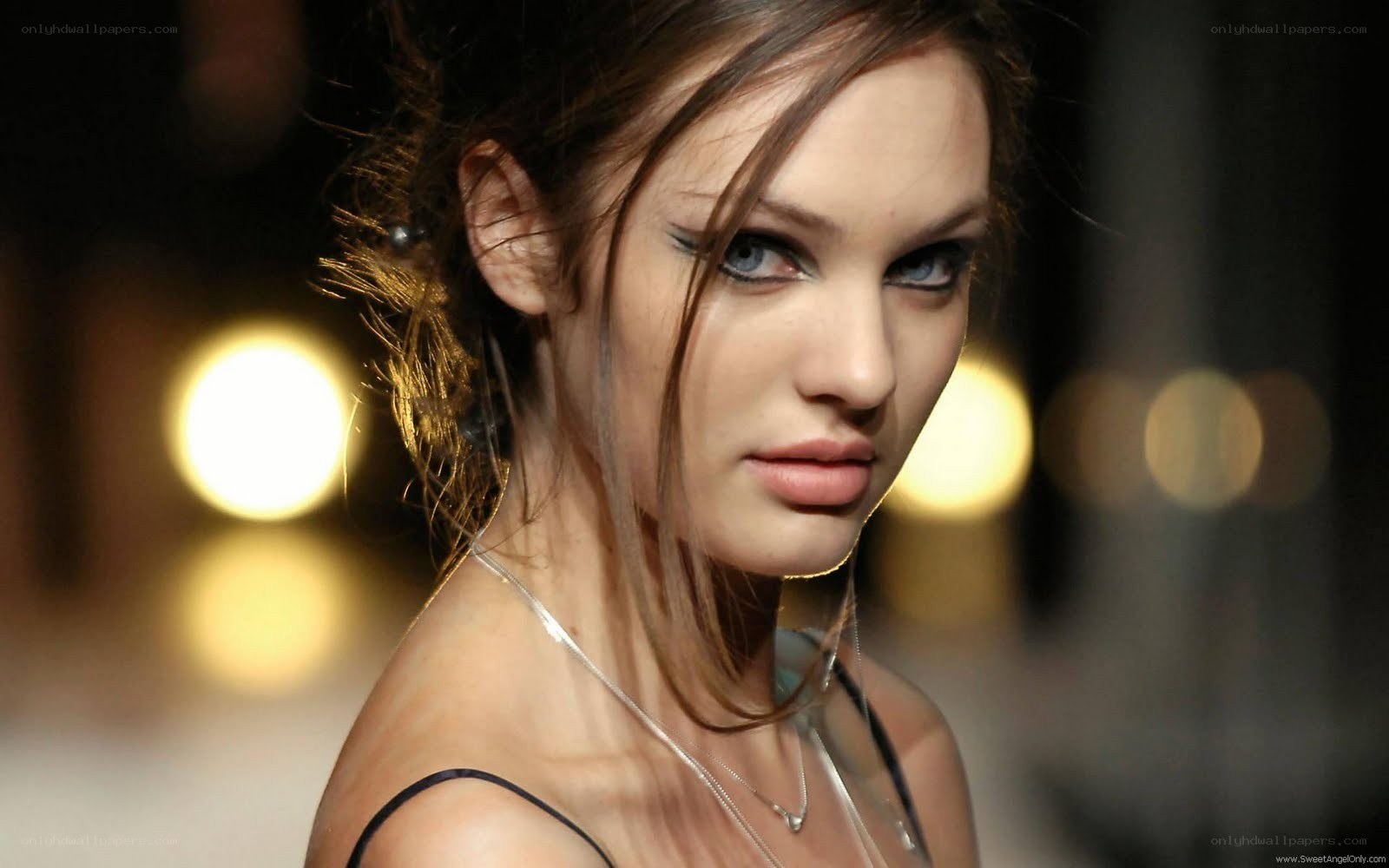 model on runway with blue eyes