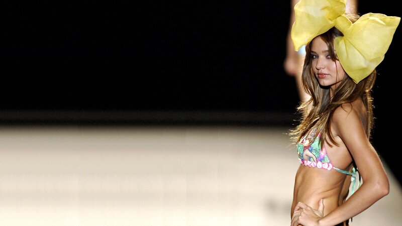Model on runway with bow