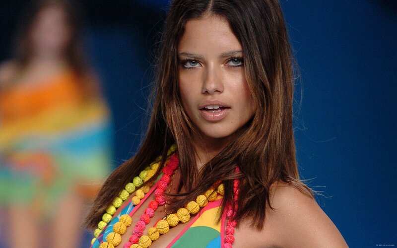 model on runway with colorful outfit