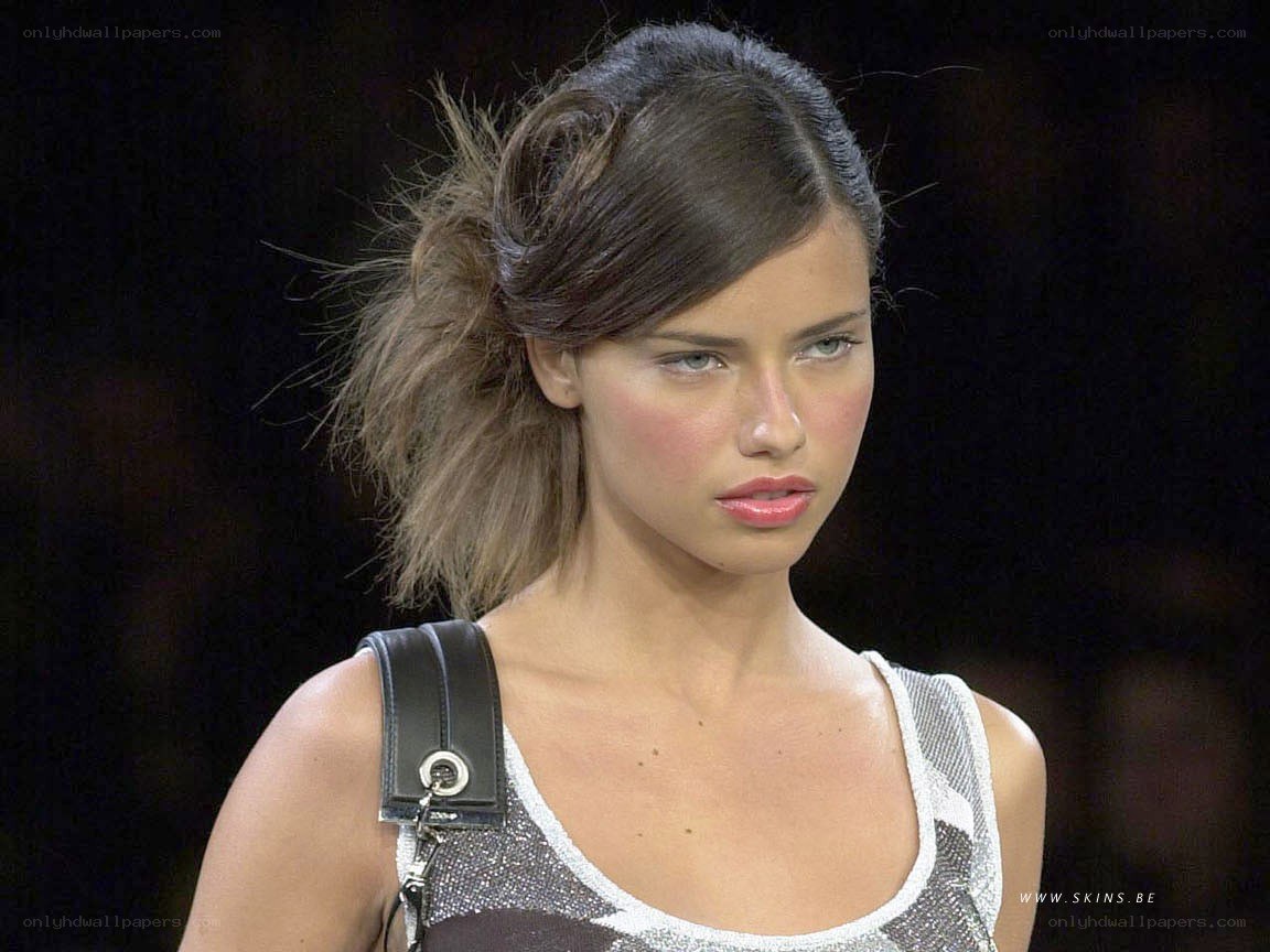 model on runway with ponytail