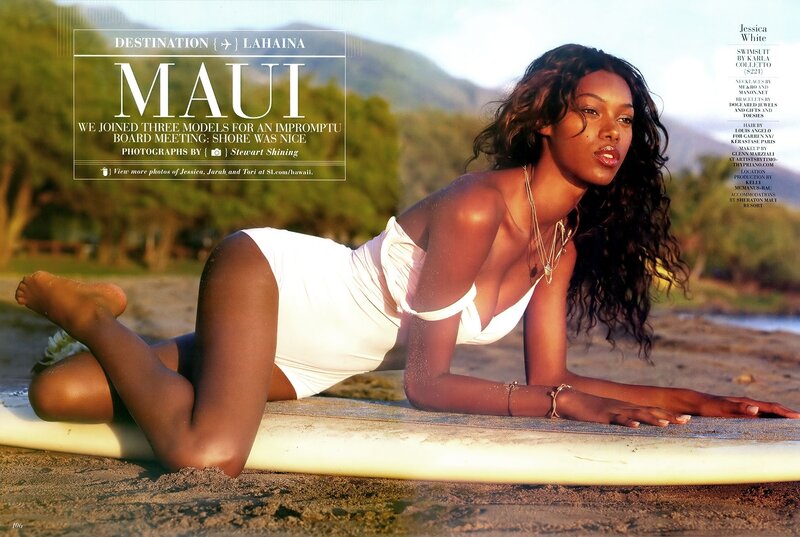 Model on surfboard in Maui