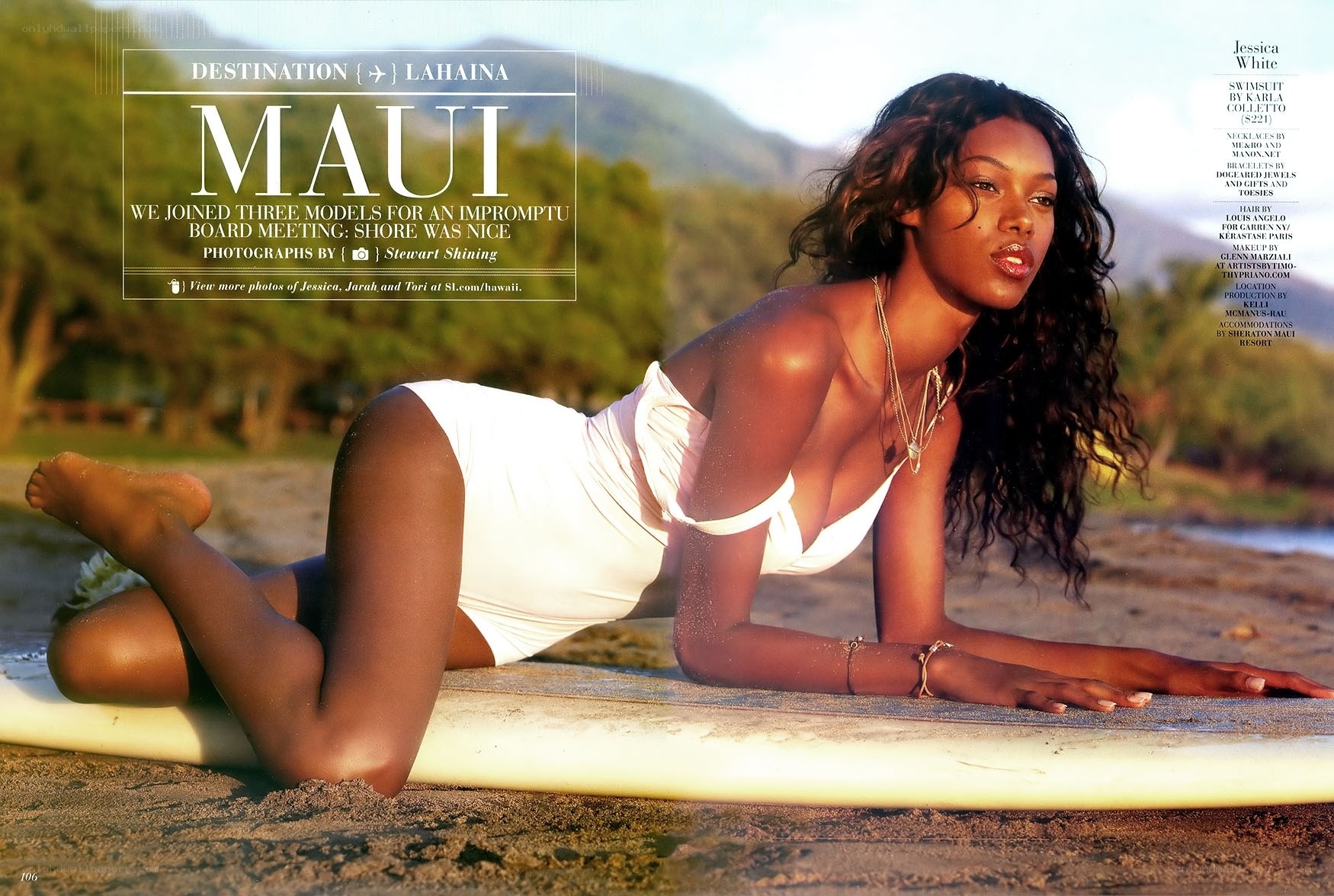Model on surfboard in Maui