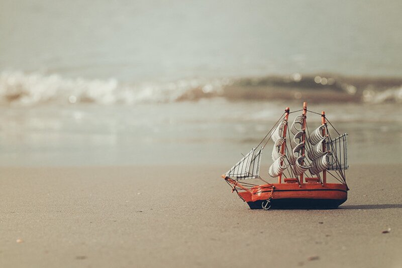 Model Sailboat on Beach