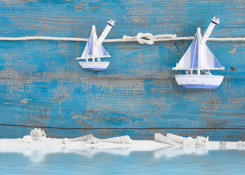 Model Sailboats on Wood