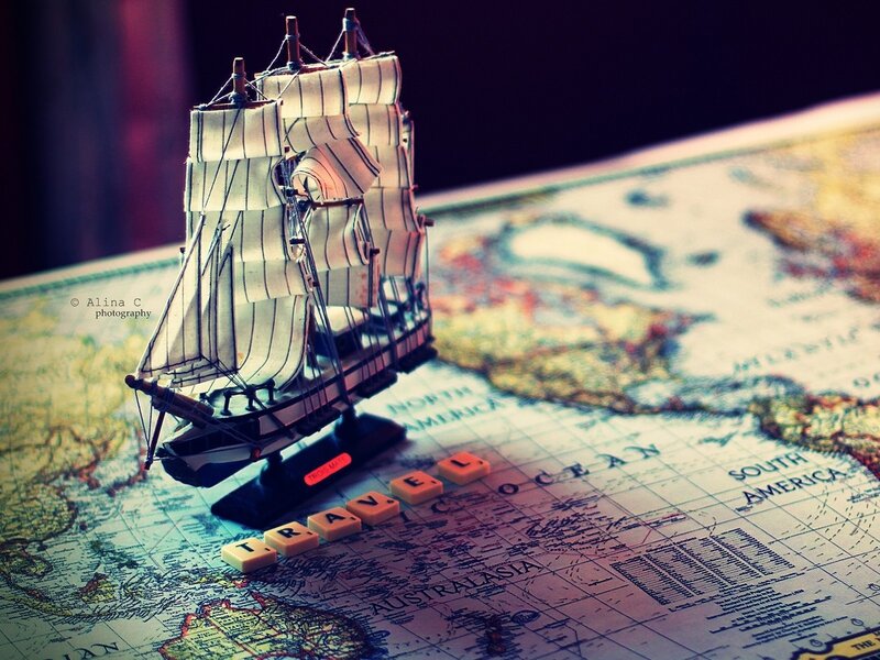 model ship on a world map