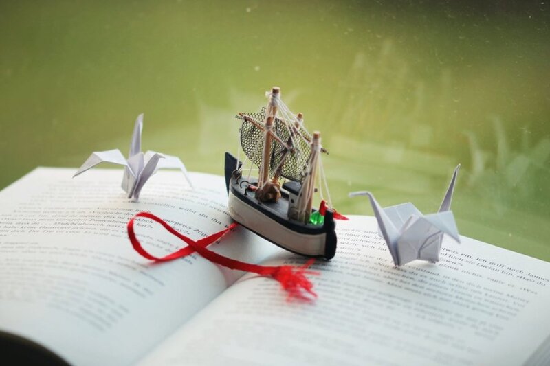 Model Ship on Book — Green