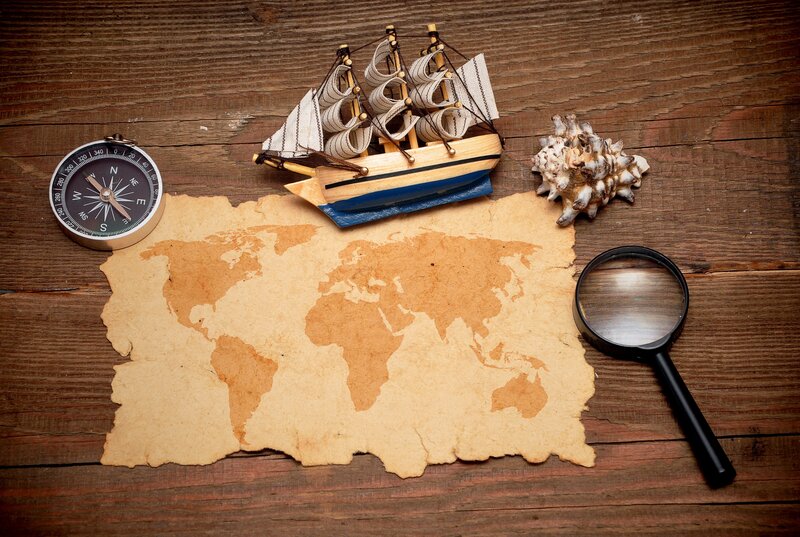 Model Ship on Map — Brown, Adventurous, Photograph, Compass