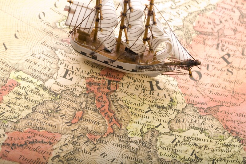 model ship on vintage map