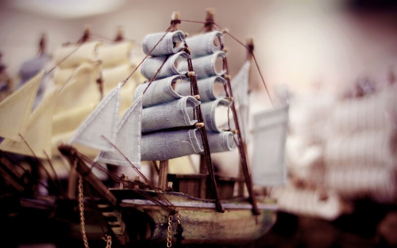 model ship with rolled sails