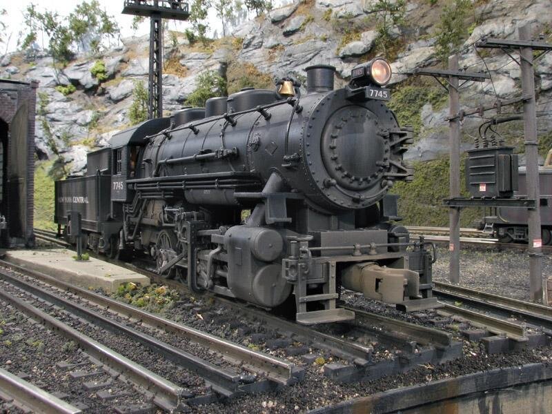 Model steam locomotive on display
