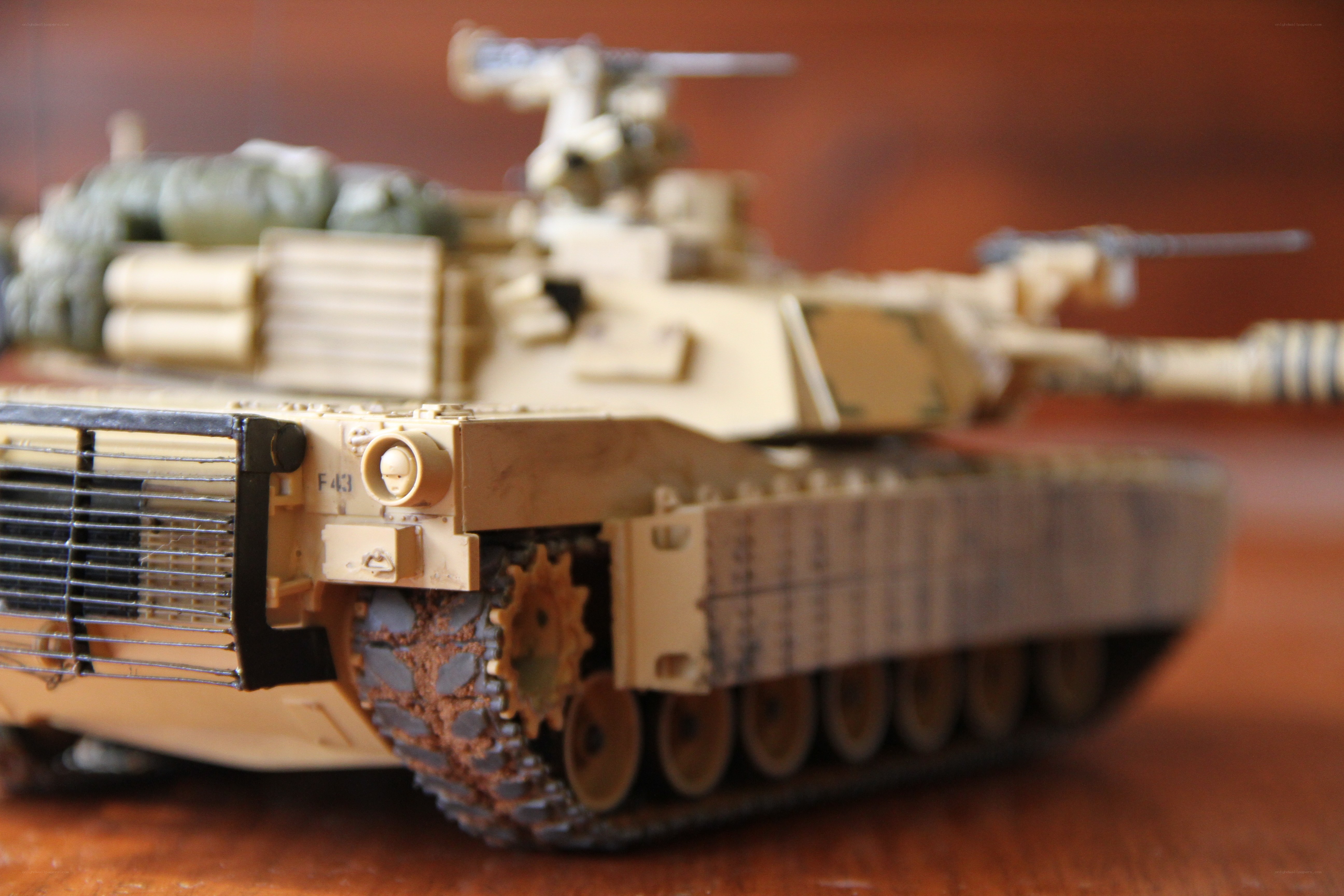 model tank on wooden surface