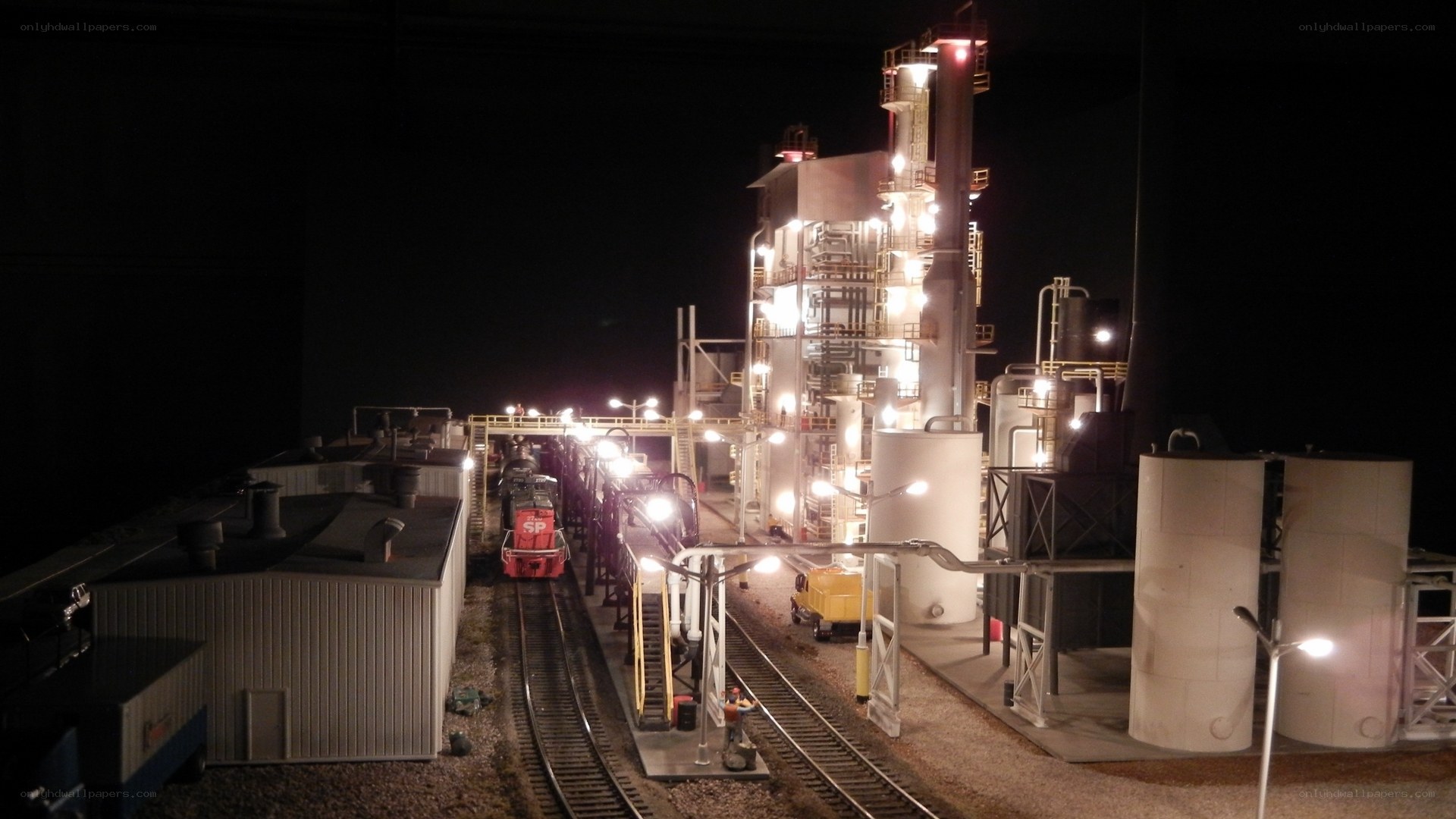model train at industrial site