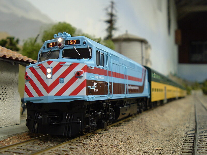 Model Train on Track — Blue