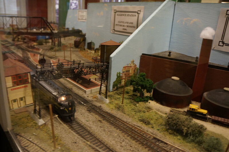 Model Train on Tracks — Brown