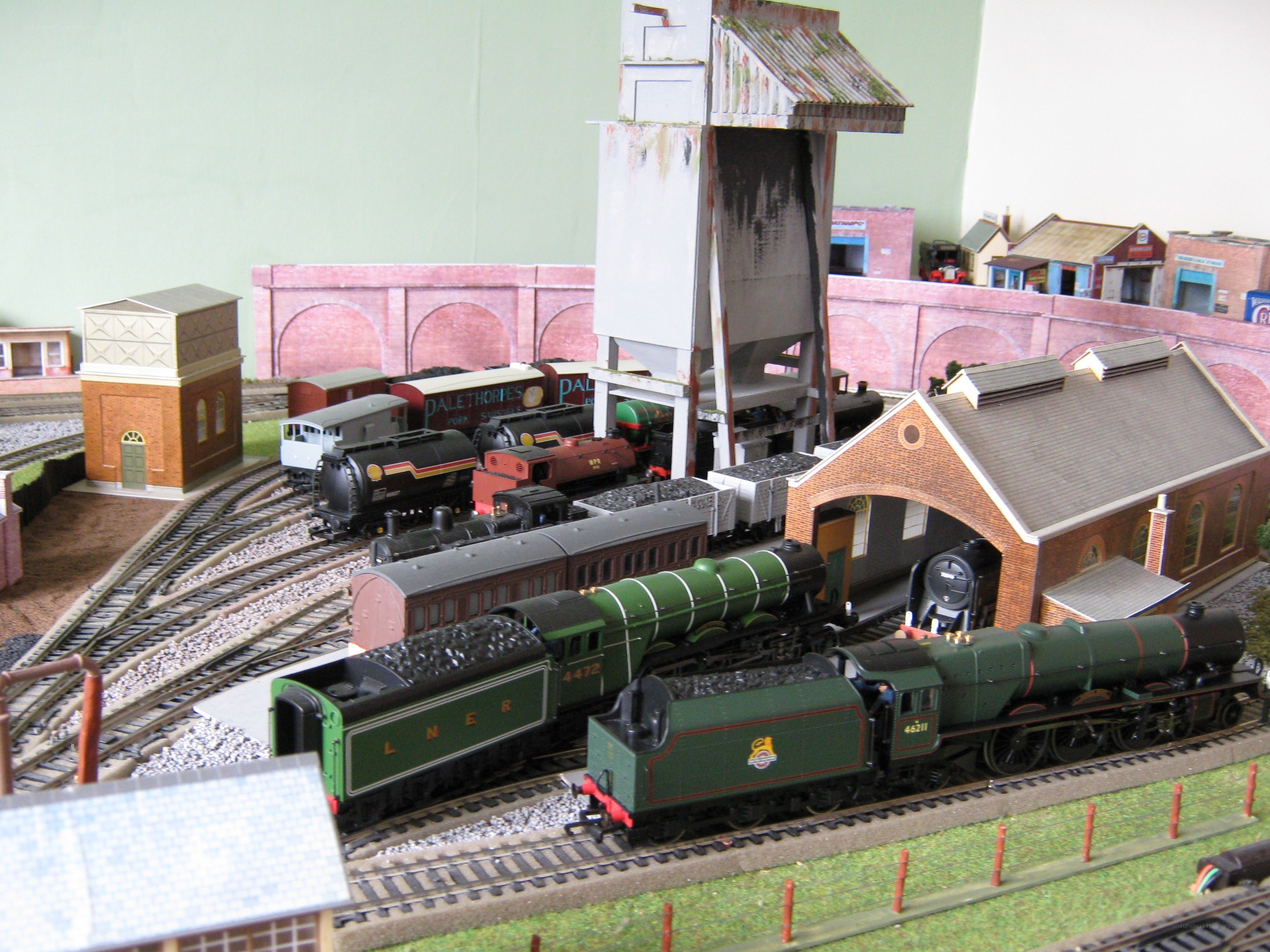 model train station with steam engines
