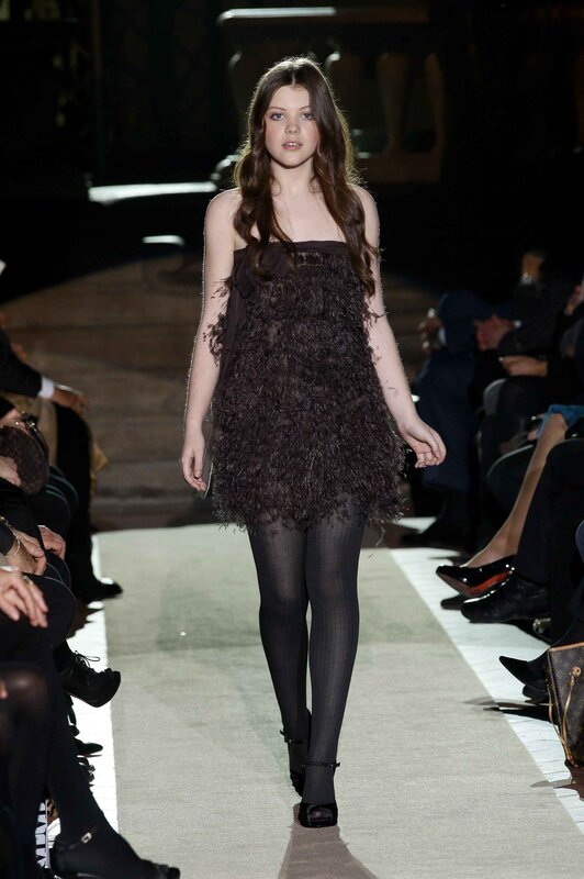 model walking down runway