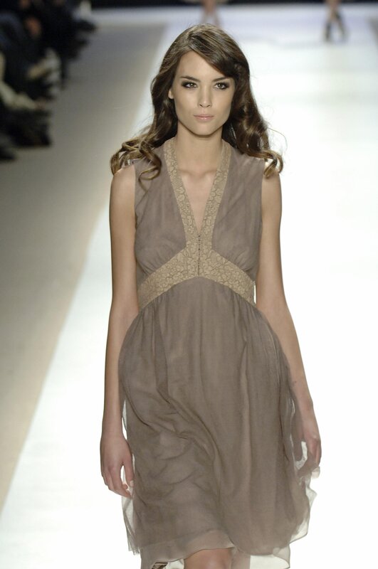 model walking down the runway