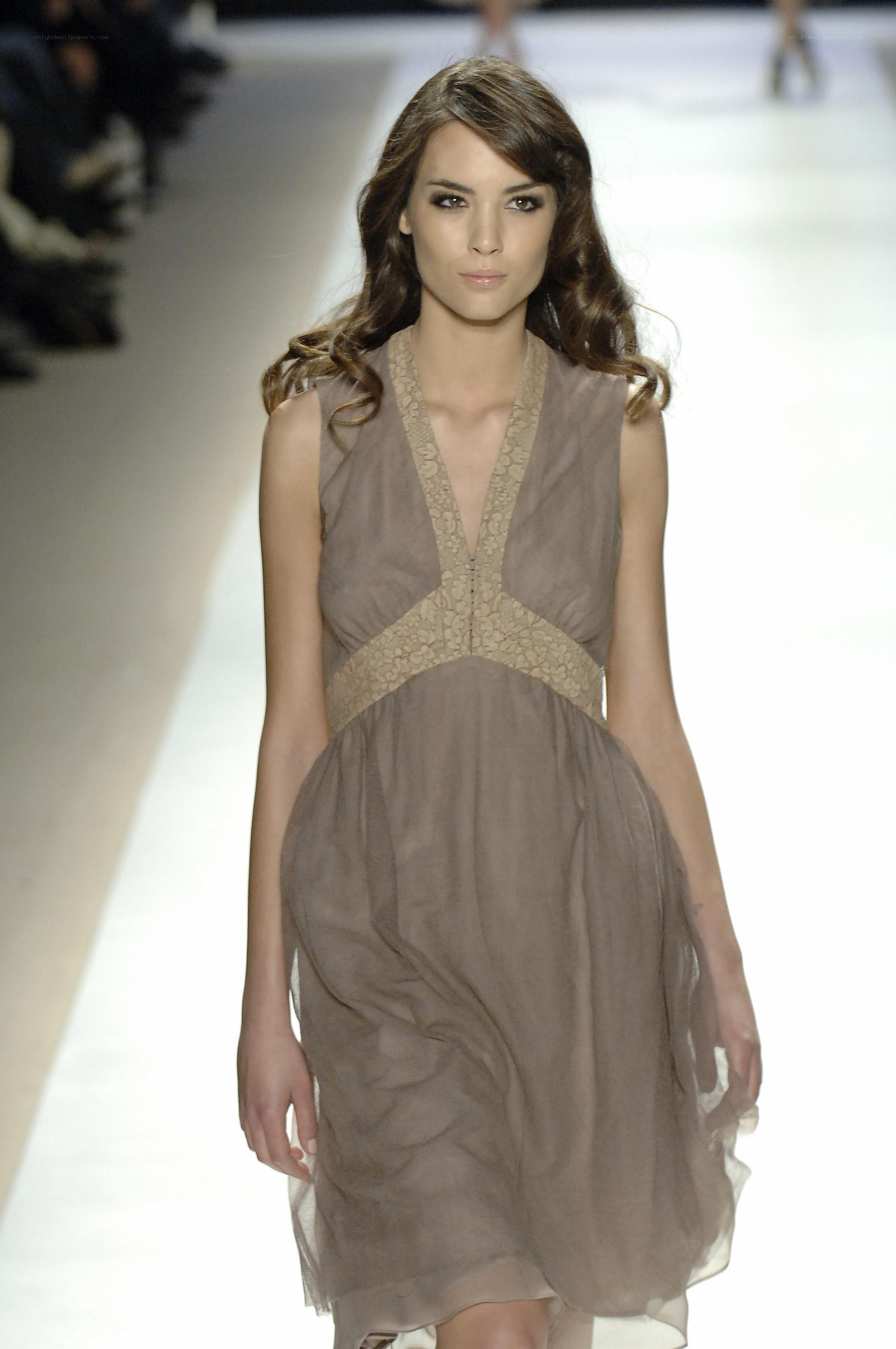 model walking down the runway