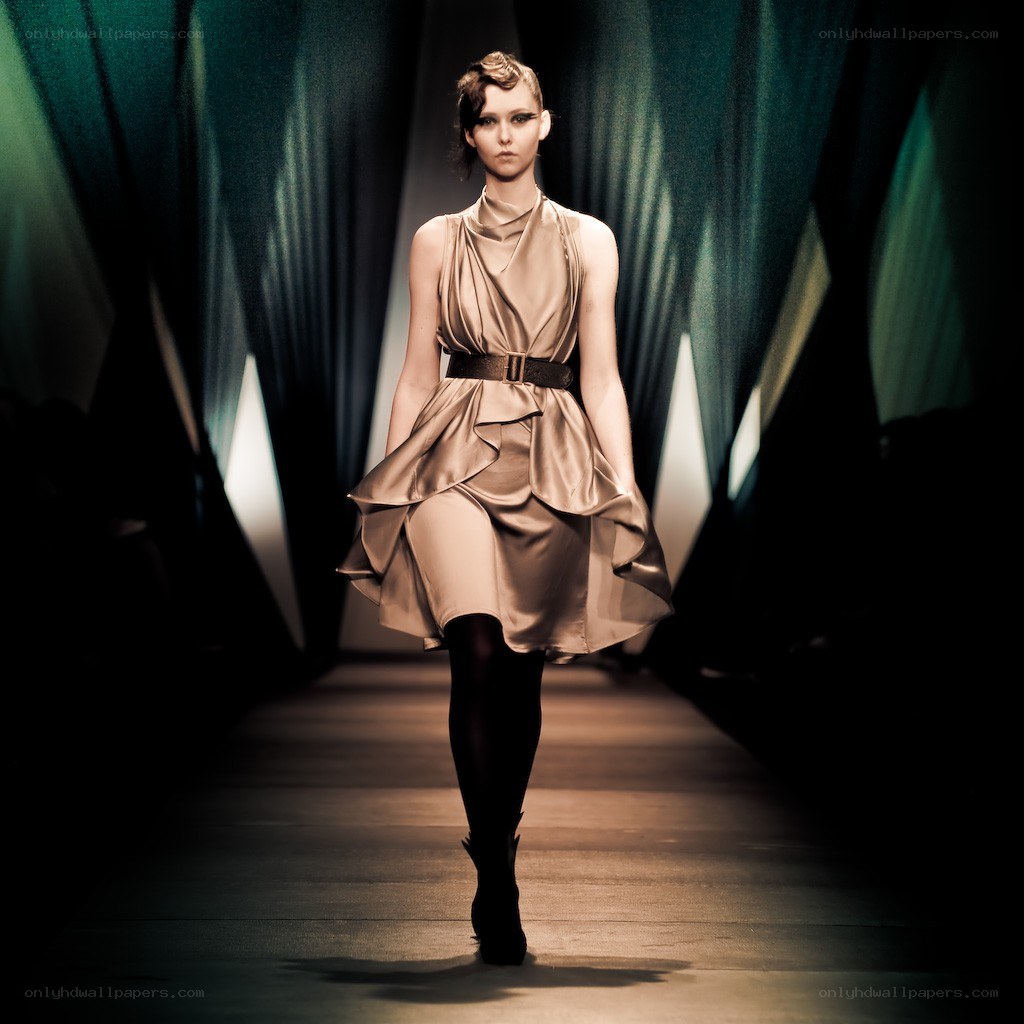 Model walks fashion runway