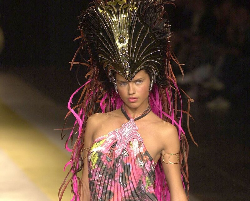 Model Wearing Feathered Headdress