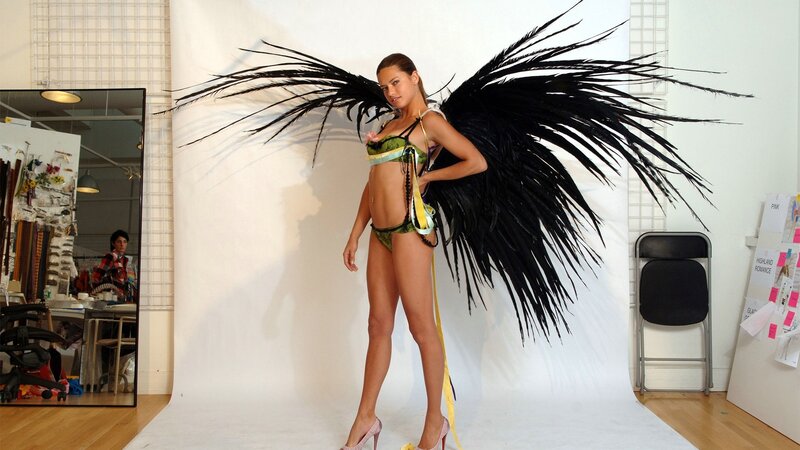 Model with black wings