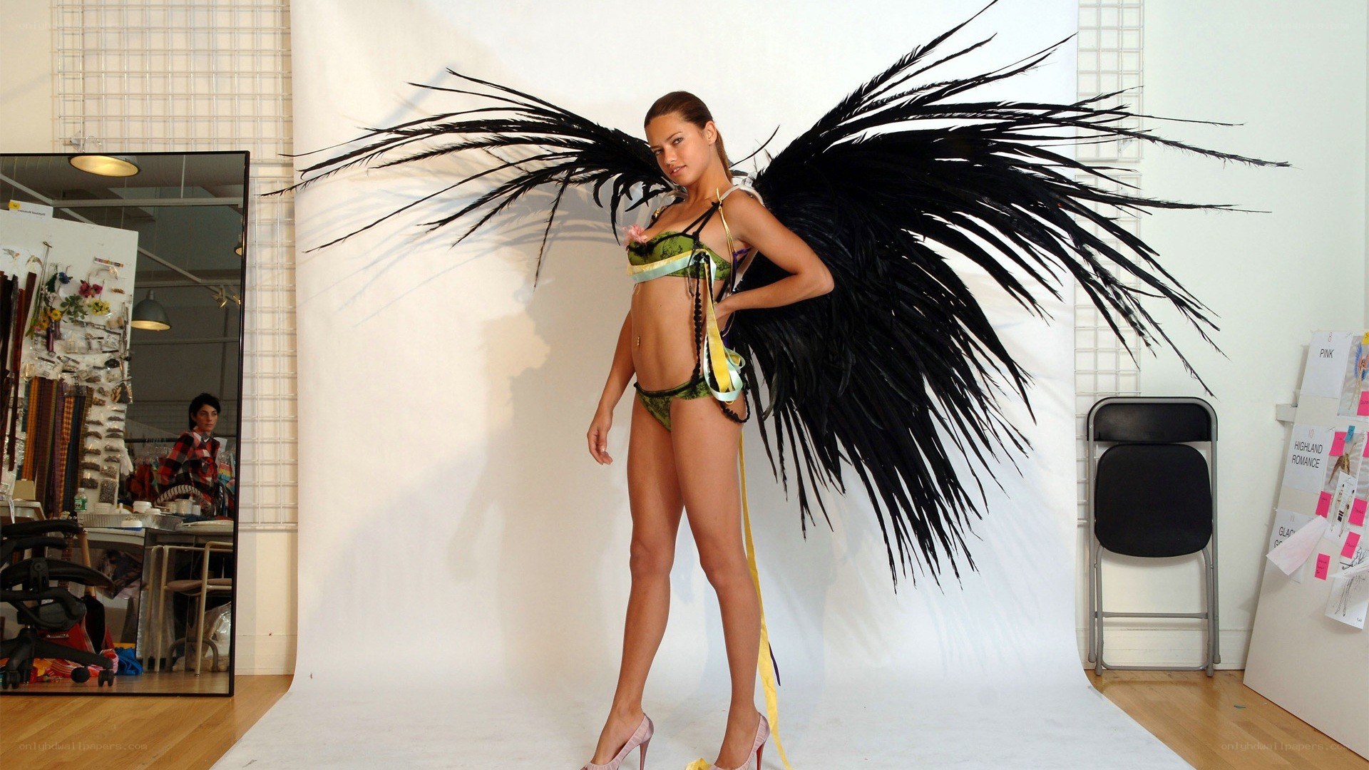 Model with black wings