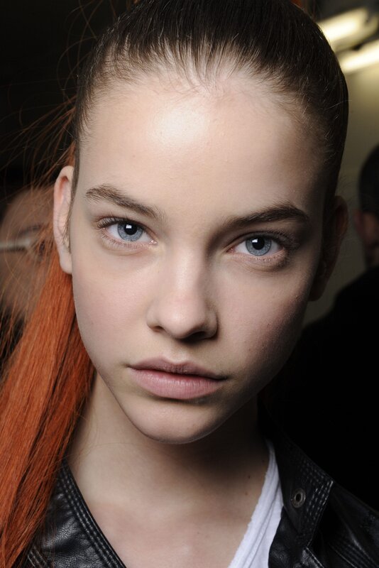 model with blue eyes and red hair