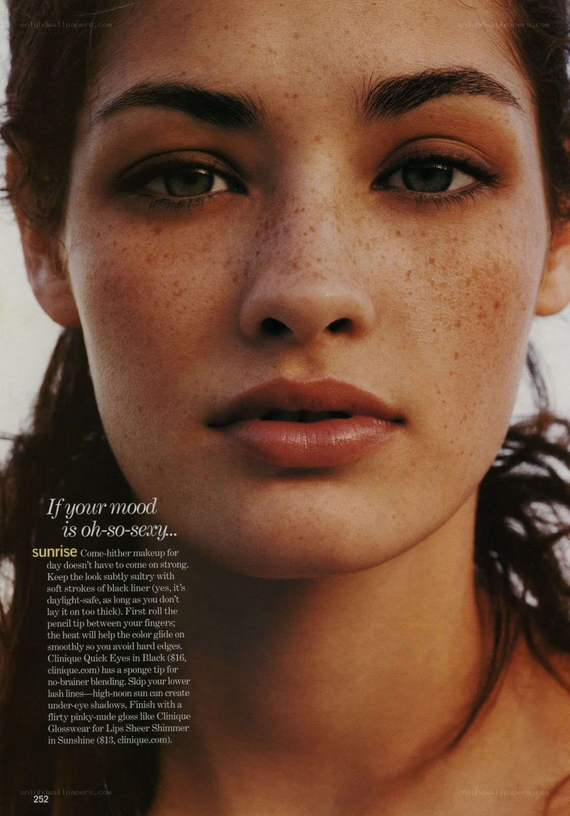 model with freckles and makeup